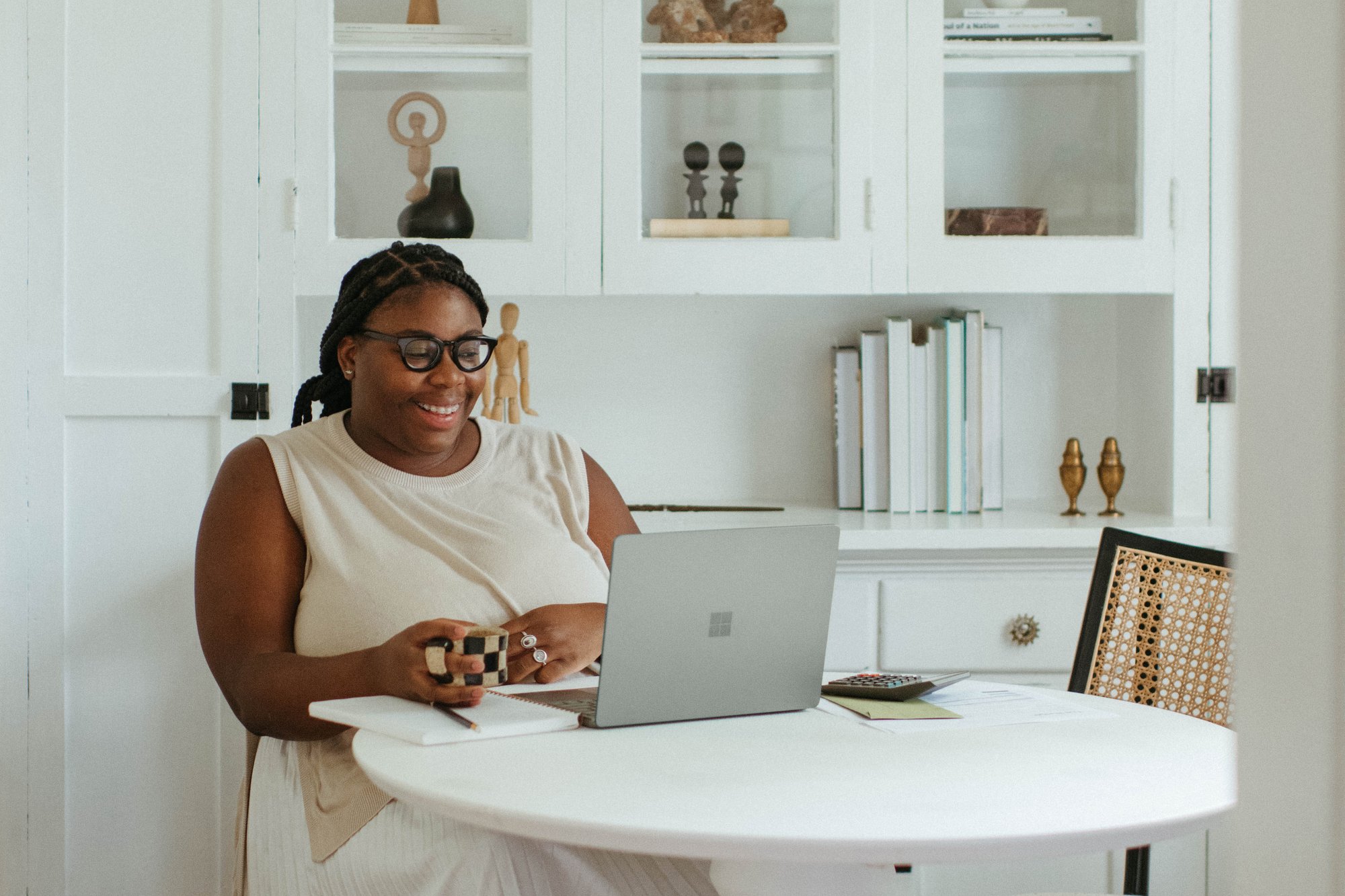 Woman Smiling with Laptop